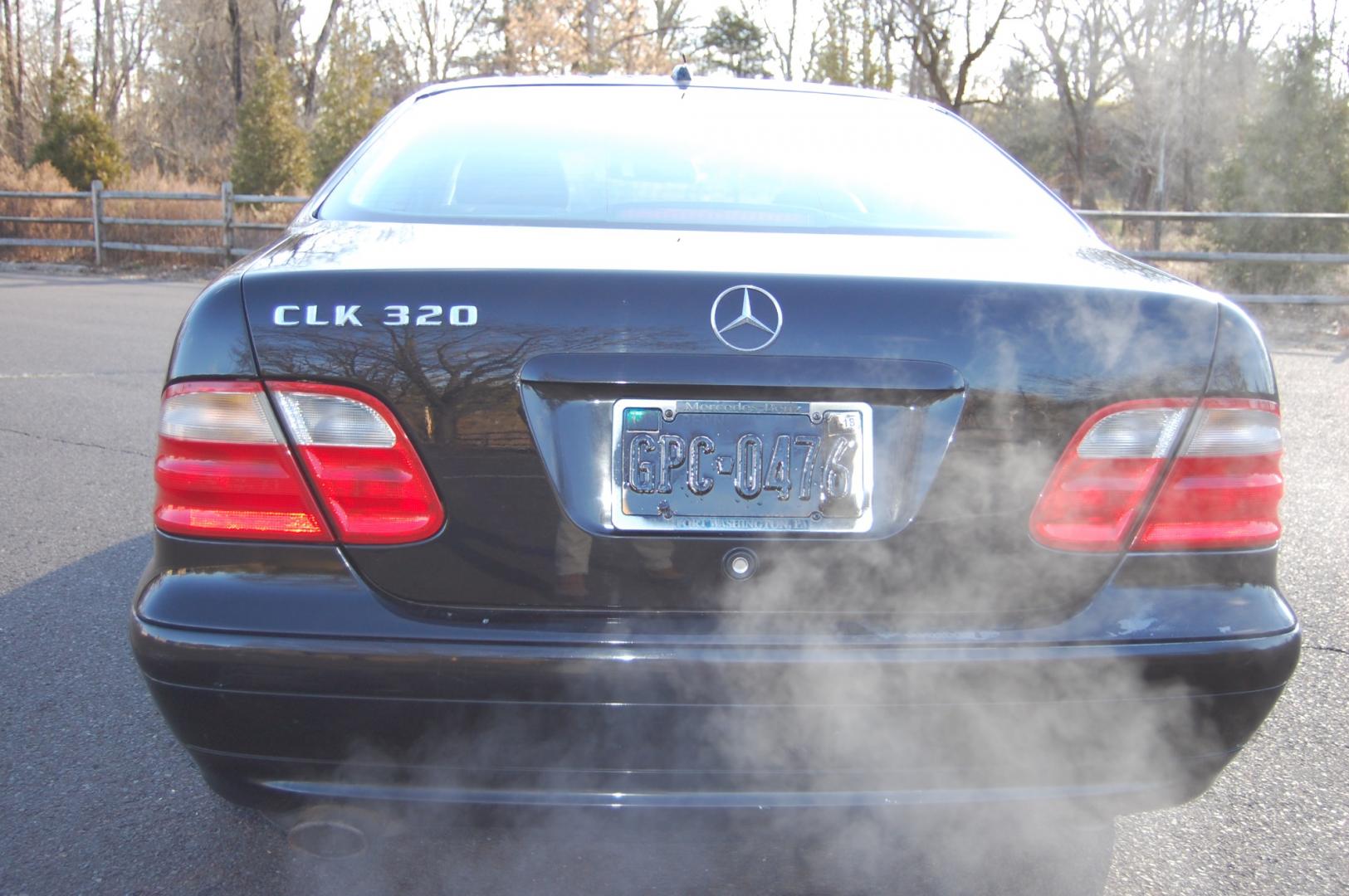 2000 Black /Black Mercedes-Benz CLK-Class (WDBLJ65G3YF) with an 3.2 Liter engine, Automatic transmission, located at 6528 Lower York Road, New Hope, PA, 18938, (215) 862-9555, 40.358707, -74.977882 - Here is a good looking, good running 2000 Mercedes Benz CLK 320 Coupe. 3.2 Liter V6 engine, auto trans, keyless entry, power moonroof, windows, mirrors, central locking system, rear sun shade, dual power seats in leather, AM/FM/6 disc CD in trunk, alloy wheels, 4 good tires . Only 90k original mi - Photo#7